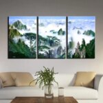 Tableau sommet des montagnes sous la brume