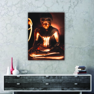 Tableau Bouddha noir. Bonne qualité, original, accrochée au-dessus d'une table dans un salon.